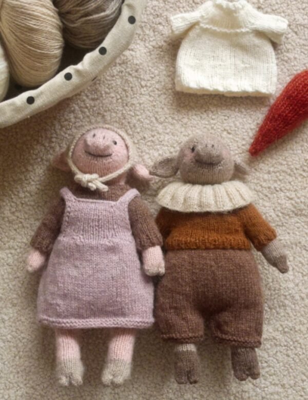 Hand-knitted pig doll