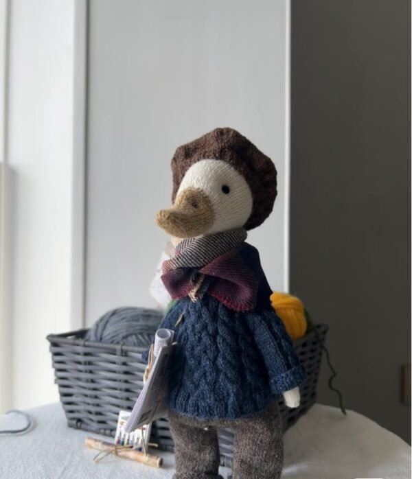 Hand-knitted goose doll