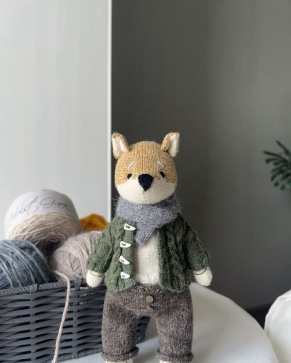 Hand-knitted dog doll